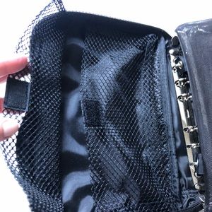 NWOT style basics cosmetic/jewelry bag with five various types of pouches.